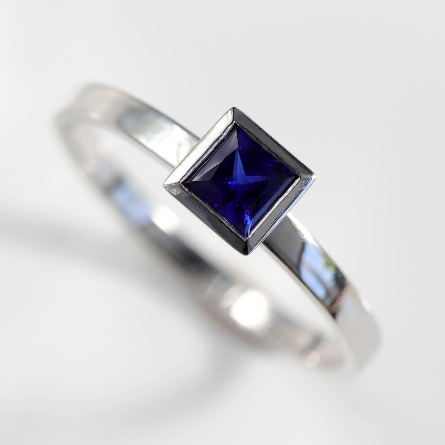 . 4mm Square Solitaire with Lab-grown Dark Blue Sapphire