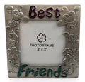 Square shaped, pewter picture frame with hearts and flower designs on each side and the word "best" written across the top and "friends" written across the bottom pf6