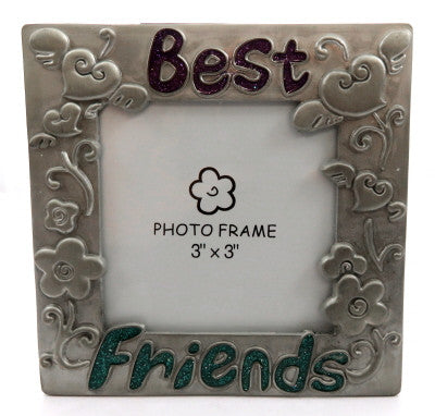 Square shaped, pewter picture frame with hearts and flower designs on each side and the word "best" written across the top and "friends" written across the bottom pf6